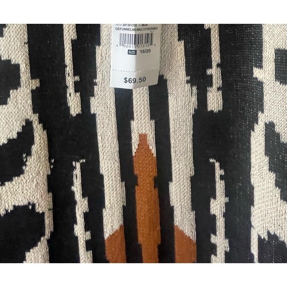 An abstract design creates a fun motif create this sweater dress. - Picture 5 of 5